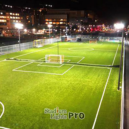 installation of soccer pitch lighting fixtures